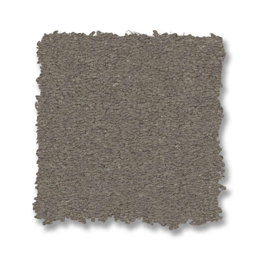 A square swatch of Finery Pet Friendly Carpet in gray with textured surface and slightly frayed edges is shown on a white background, highlighting its durable and stylish look.