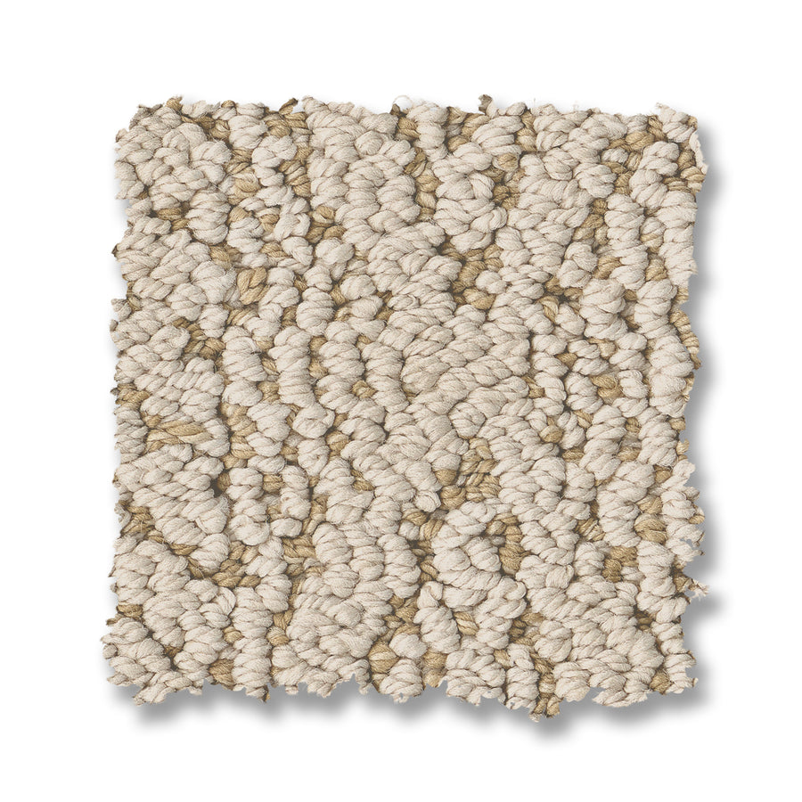 A rectangular swatch of Crochet Berber Carpet in textured, looped beige with light brown and cream fibers, showcasing its classic Berber texture and luxury appeal, shown on a white background.