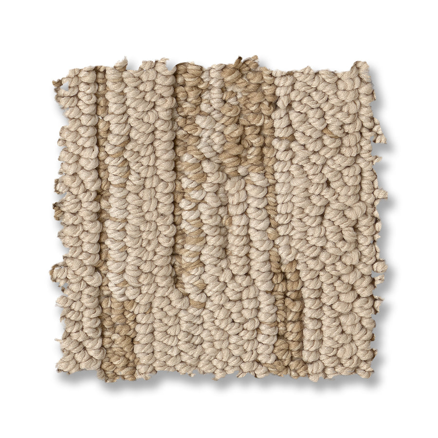 The Loom Berber Carpet sample, featuring a square shape and thick looped texture in beige and light brown tones, is displayed on a white background for a sophisticated look.