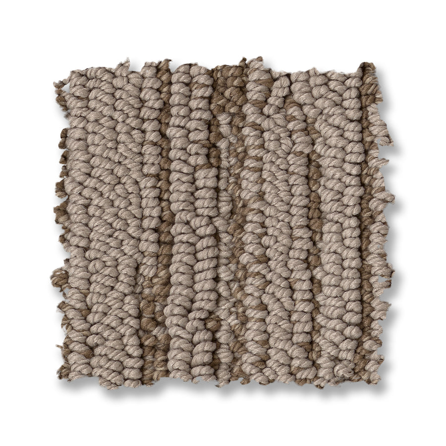 A square swatch of Loom Berber Carpet features thick, looped beige and brown yarns in a chunky, textured weave pattern on a white background for a sophisticated look.