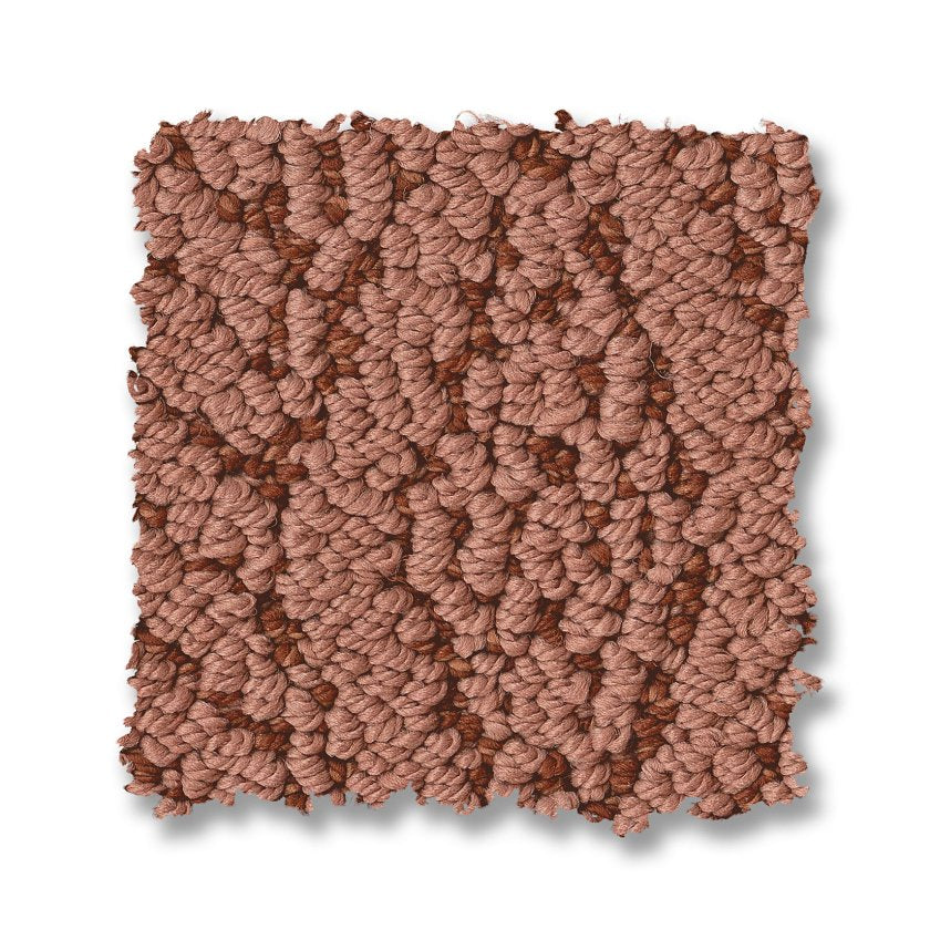 A sample swatch of Crochet Berber Carpet in dusty rose shows its textured loop-pile design with thick yarn fibers and slightly uneven edges, displayed on a white background.