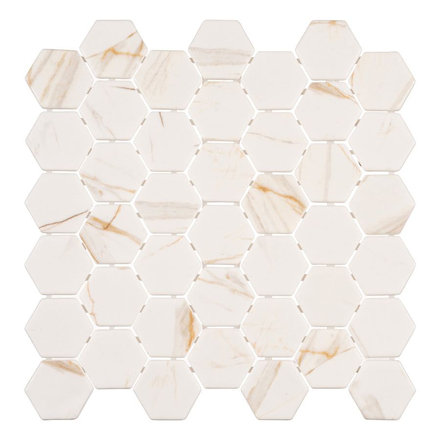 The Mayan Garden Hexagon Glass Mosaic Tile in Sun Rays features hexagonal tiles with subtle beige and gold veining arranged in a grid, evoking an elegant marble mosaic look.