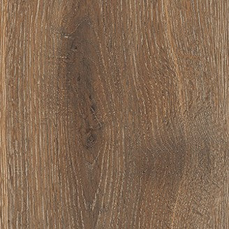 Close-up of Maison 9x48 Porcelain Tile shows a warm brown tone and visible grain patterns, mimicking real wood. Its rustic texture and subtle color variation create an authentic, inviting look ideal for any space.