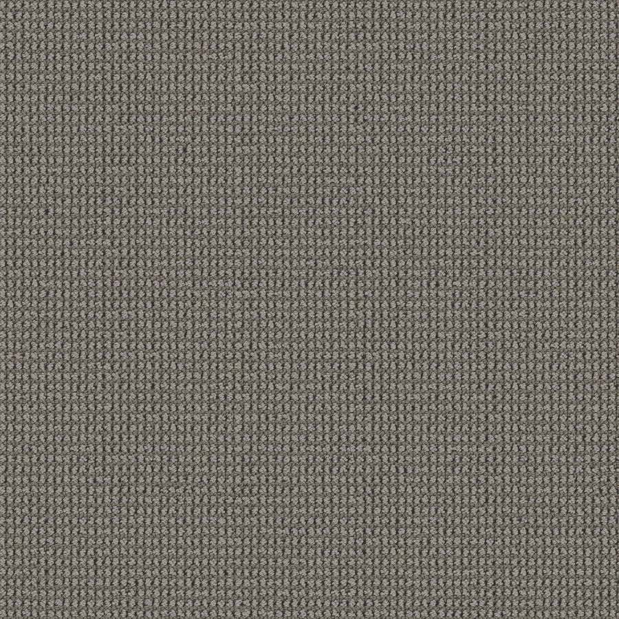 Close-up of the Knitted Tone Blue Pet Friendly Carpet in Magnetic color, showing its textured surface with a tight, even weave pattern that creates a uniform, slightly raised grid effect.
