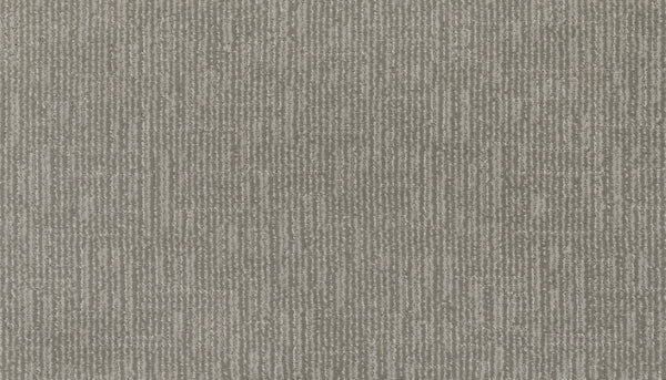 Close-up of Magnetic Vision Family Friendly Carpet in Breathless, featuring a textured gray surface with subtle intersecting lines and rectangles for a modern look—ideal as a durable option for family spaces.