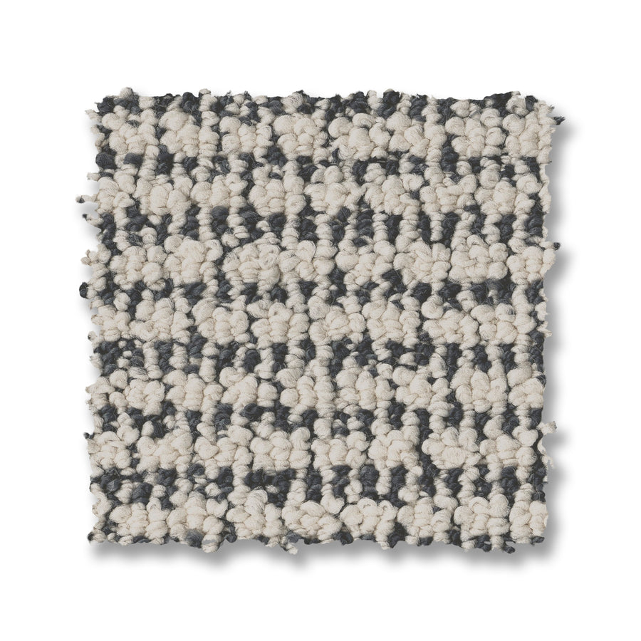 A square swatch of Laine On Trend Carpet displays textured loops and alternating dark gray with off-white rows on a white background—ideal for adding a touch of luxury to your space.