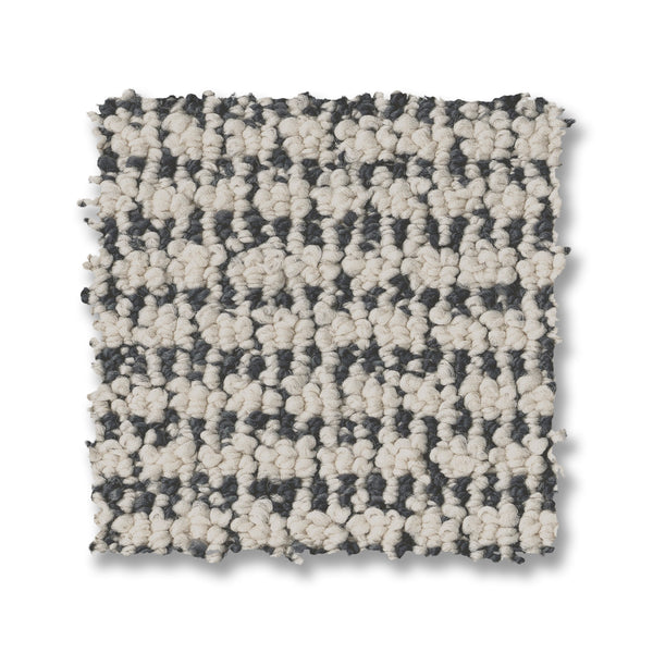 A square swatch of Laine On Trend Carpet displays textured loops and alternating dark gray with off-white rows on a white background—ideal for adding a touch of luxury to your space.