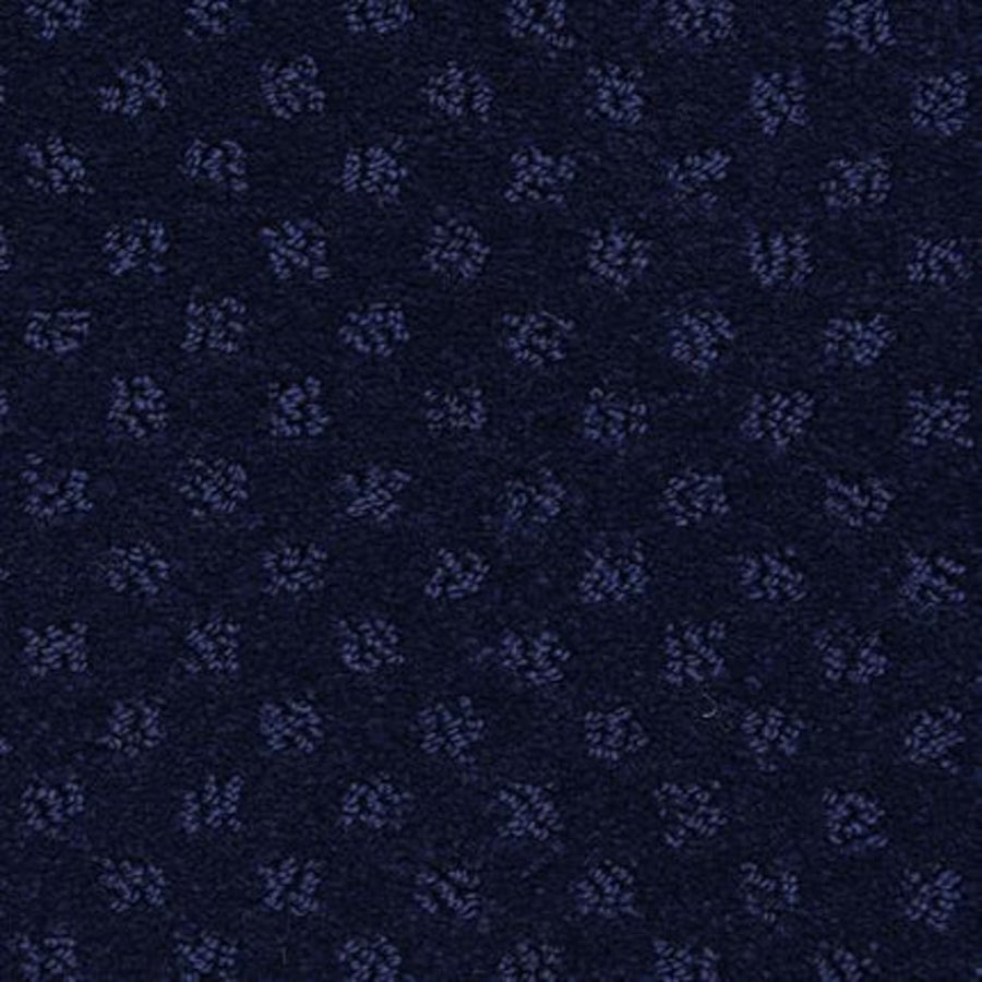 Dreamer On Trend Carpet in Majesty features a dark blue textile with a subtle, repeating dotted pattern in lighter blue, offering durable luxury flooring with a textured and elegant appearance.