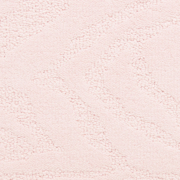 Close-up of Capetown On Trend Carpet in Malay, a soft, pale pink fabric with a subtle wavy zigzag pattern. This plush material is perfect for cozy blankets or adding comfort and style to high-traffic spaces.
