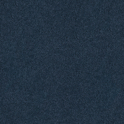The Tribute Family Friendly Carpet in Mandalay features a dark blue, subtly textured surface with a soft, slightly fuzzy look—making it both inviting and practical for family spaces.
