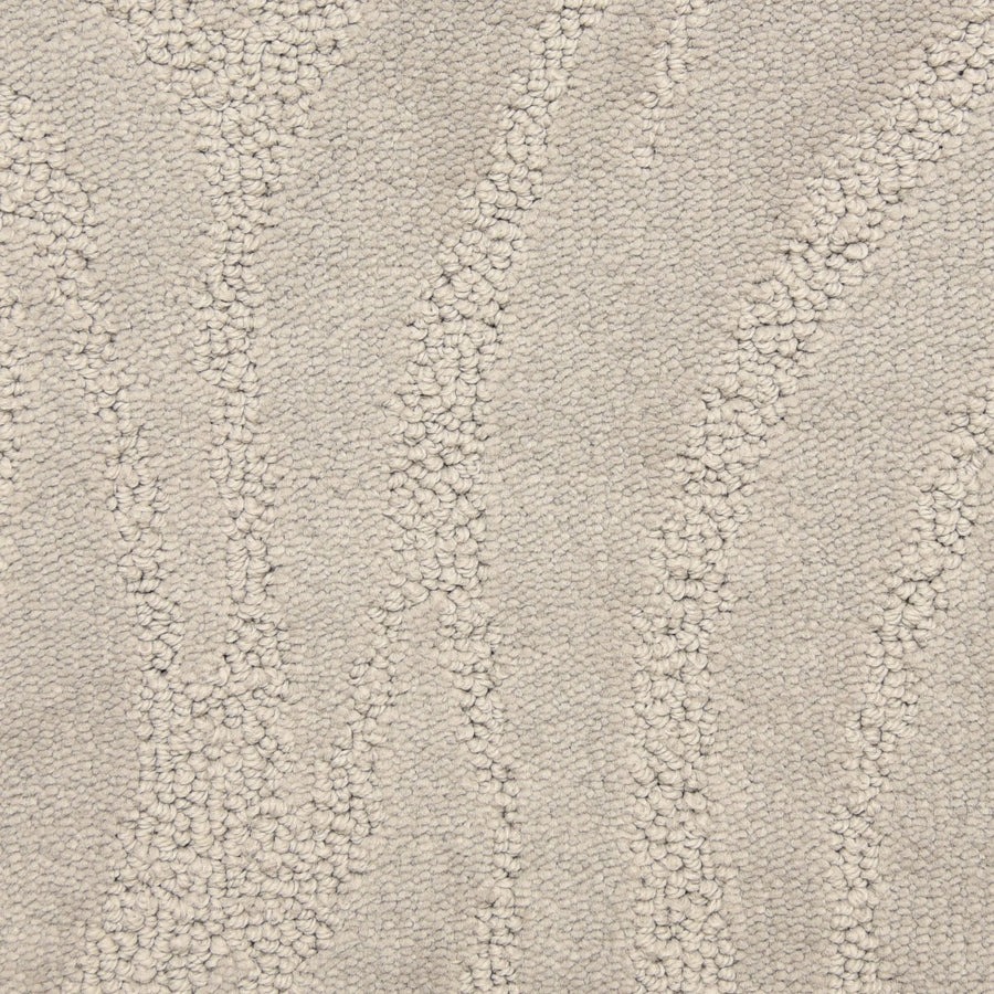 Close-up of the Capetown On Trend Carpet in Mandela, featuring a light beige tone with a subtle wavy pattern and a blend of looped and cut fibers for a soft, raised texture—perfect for high-traffic areas.