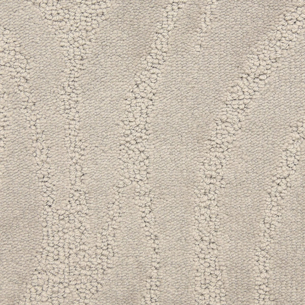 Close-up of the Capetown On Trend Carpet in Mandela, featuring a light beige tone with a subtle wavy pattern and a blend of looped and cut fibers for a soft, raised texture—perfect for high-traffic areas.