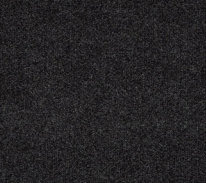 The Windsurf Pet Friendly Carpet in Marcasite features a dark gray, textured surface with a subtle pattern. Its soft, close-knit fibers resemble wool, offering consistent color and contemporary style that's comfortable and pet-friendly.