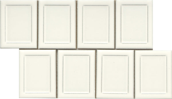 Eight Marco and Polo 4x5 Glossy Porcelain Tiles in Marco White, arranged in two uneven rows; each tile has a recessed rectangular border for a framed, designer-inspired look.