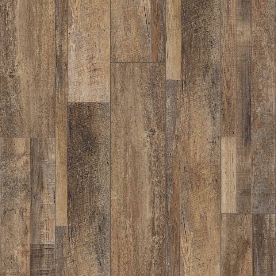 Close-up of Coretec Plus Enhanced Vinyl planks in a staggered layout, featuring natural brown hues and wood grain textures with rustic details for an aged look—an ideal stylish, waterproof flooring choice.