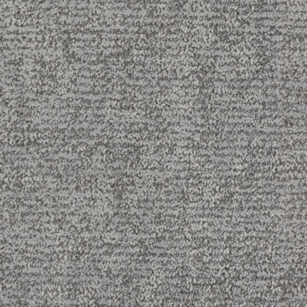 Close-up of Balance Family Friendly Carpet in Mellow—textured gray with dense, looped fibers and a soft, slightly mottled pattern. Subtle tone variations offer a modern, neutral look for a stylish, durable, and stain-resistant choice.