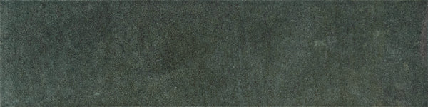 A rectangular swatch of Menagerie 2.5x9.5 Porcelain Tile in dark green, featuring a soft, slightly textured surface and subtle shading variations for a handmade look.