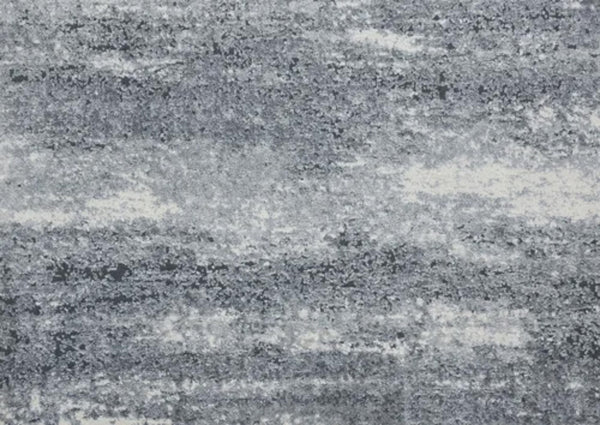 Rock And Roll On Trend Carpet in Metal features a gray and white abstract pattern with horizontal streaks, offering a stylish, durable finish perfect for elevating any space and withstanding high-traffic areas.