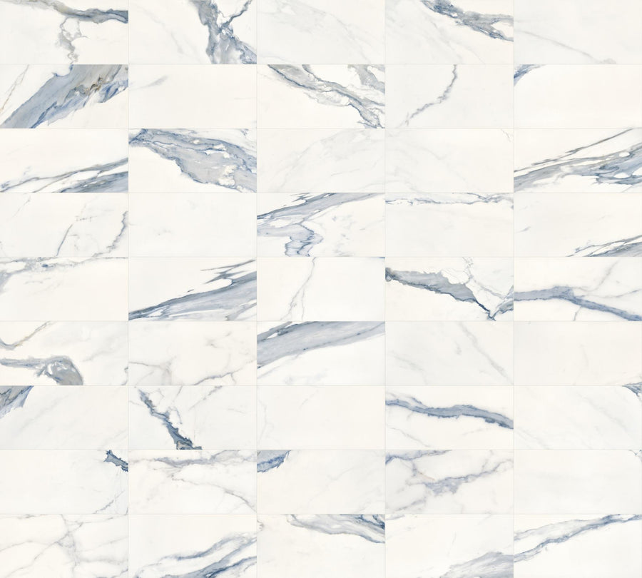 White marble tiles with gray and blue veining arranged in a grid pattern, creating a seamless, elegant, and modern surface suitable for floors or walls.