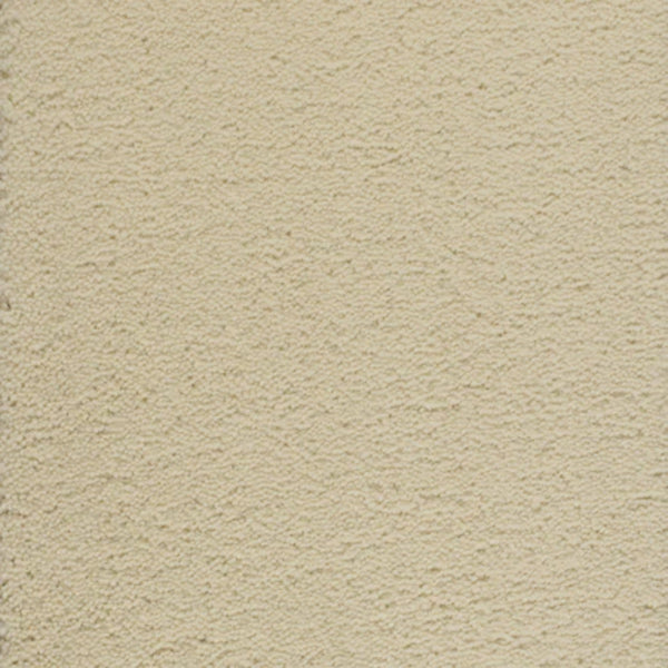 A close-up view of Dolce Family Friendly Carpet in Milkshake—ideal for high-traffic areas, featuring a beige textured surface with small ridges and indentations for added durability.