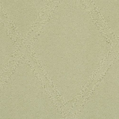 A close-up view of the Braided Opulence Berber Carpet in Mineral, showcasing its durable construction and subtle diamond pattern formed by gently raised textured lines.