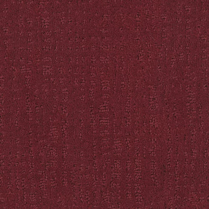 A close-up of Homage Berber Carpet in Mirage color, featuring a textured, slightly velvety surface with a subtle, irregular pattern reminiscent of luxury.