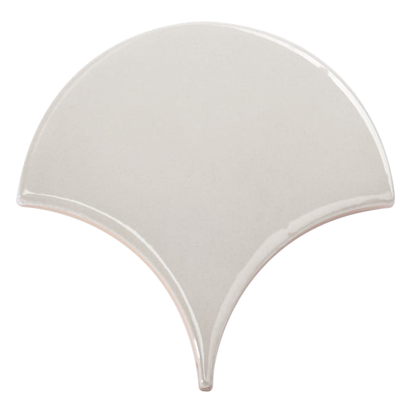 The Tidal 2x5 Ceramic Tile features a glossy light gray finish and a distinctive fan-shaped design, bringing elegant luxury to any space.