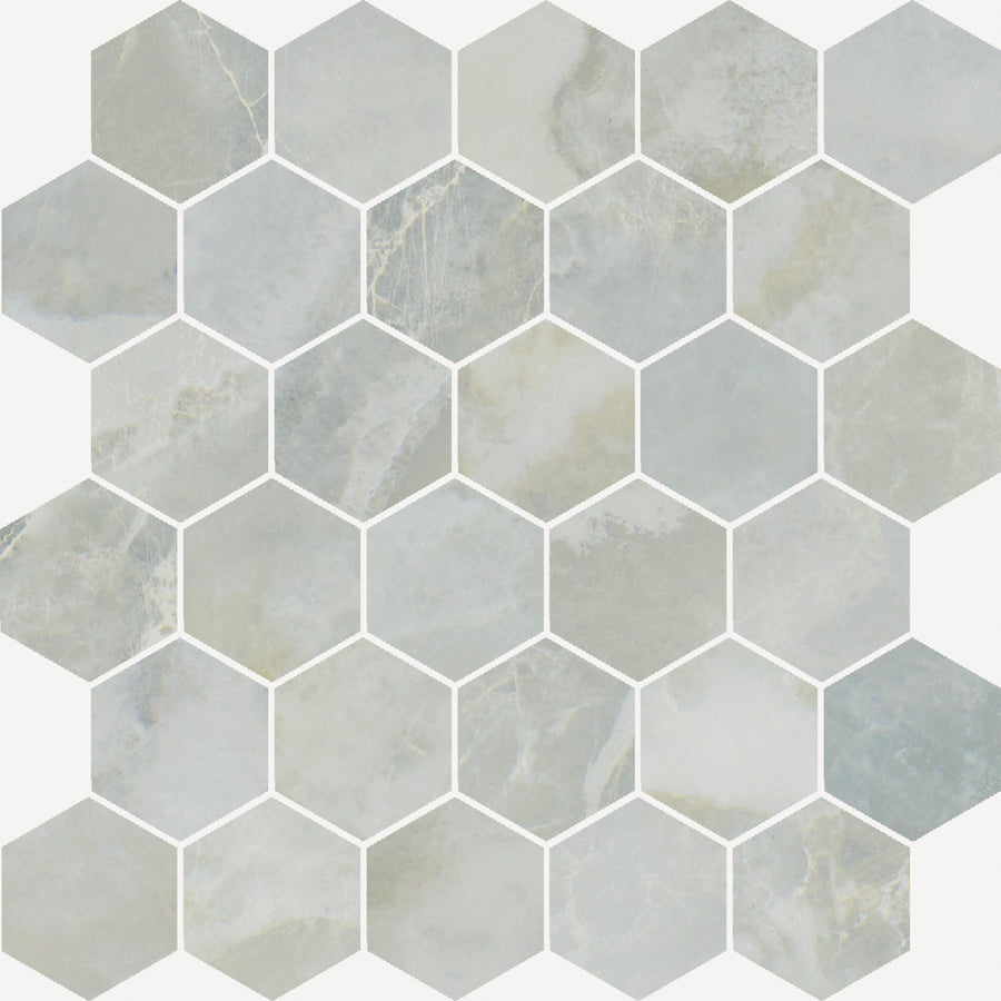 The Monaco Hexagon Mosaic Porcelain Tile features light gray and beige shades in a honeycomb pattern, accented by thin white grout lines and a honed marble look for a luxurious surface with elegant veining and subtle natural texture.