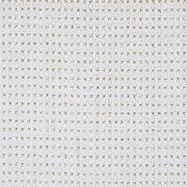 Close-up of Top Notch Berber Carpet in Monument color, featuring a cream-toned waffle weave with a textured grid-like pattern and small square indentations, evoking the look of premium flooring.