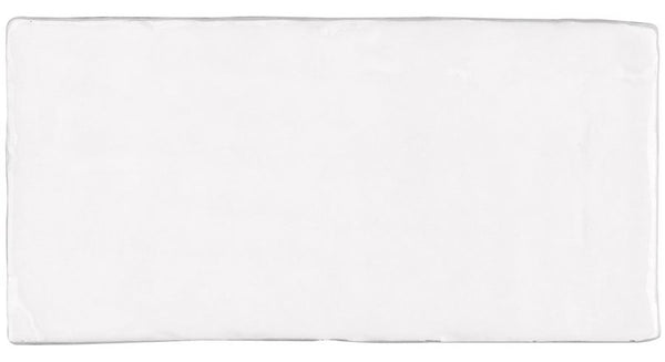 The Morocco 4x8 White Body Ceramic Tile features a smooth, glossy finish and subtly irregular edges, bringing rustic allure and timeless charm to any space.