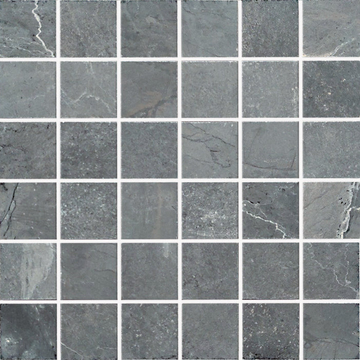 The Gemini 2x2 Mosaic Tile features a grid of square dark gray marbled porcelain tiles with subtle white veining and thin white grout lines, forming an elegant mosaic pattern.