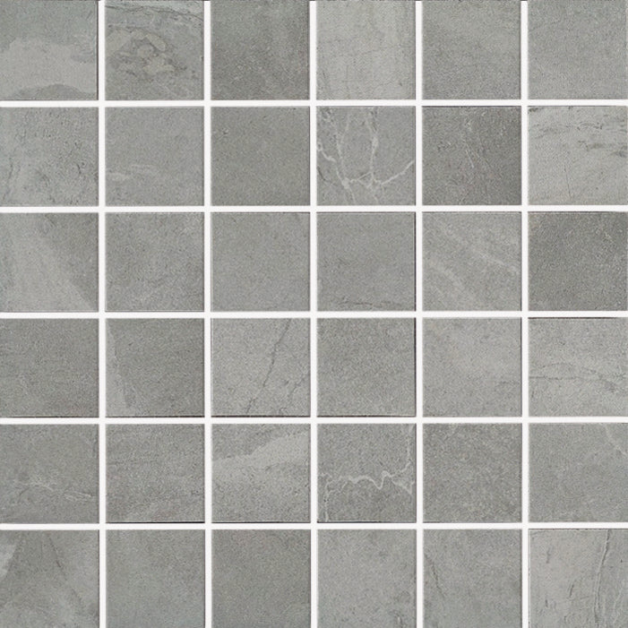 The Gemini 2x2 Mosaic Tile showcases gray marbled porcelain stoneware squares with gentle white veining and subtle shading, arranged in a grid with thin white grout lines for an elegant, stone-inspired look.