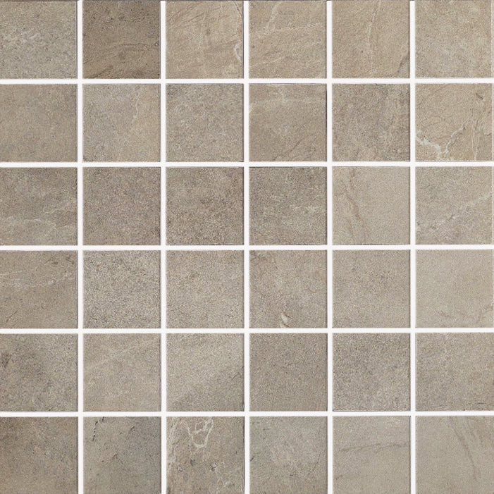 The Gemini 2x2 Mosaic Tile features a grid of square beige and gray marbled porcelain tiles with subtle texture variations, separated by crisp white grout lines for a refined look.