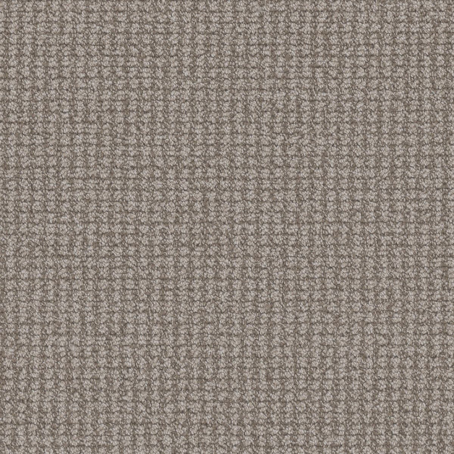 Close-up of a textured Mykonos Berber Carpet in Athens color, showing a soft berber weave with a small, repeating square pattern that adds subtle shading and luxurious style to any room.