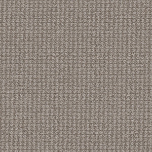 Close-up of a textured Mykonos Berber Carpet in Athens color, showing a soft berber weave with a small, repeating square pattern that adds subtle shading and luxurious style to any room.