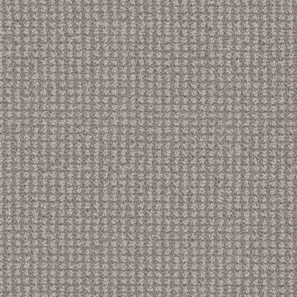 Close-up of the Mykonos Berber Carpet in Paradise, showcasing its textured, tight grid-like berber weave and soft, woven appearance—ideal for luxury flooring.