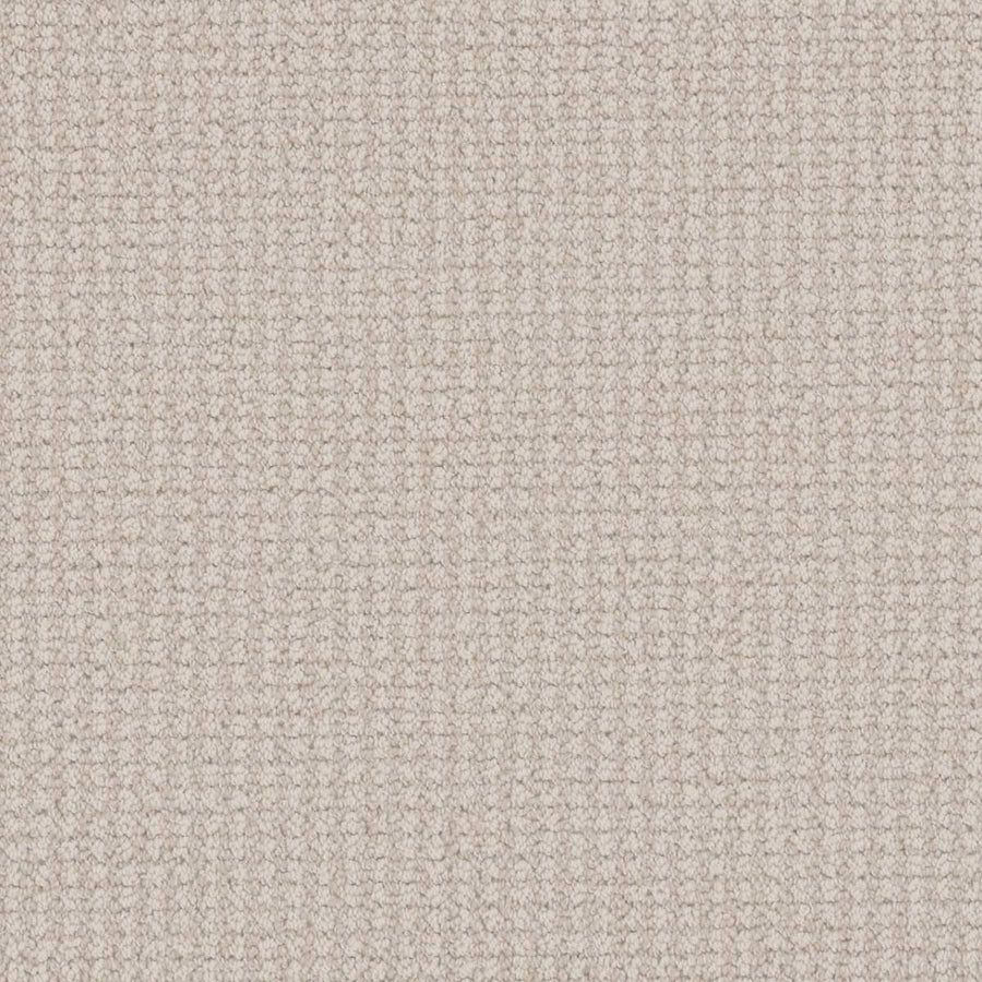 Close-up of Mykonos Berber Carpet in Sorrento, featuring a soft beige tone and textured grid-like weave with small, evenly spaced squares for a luxurious look.