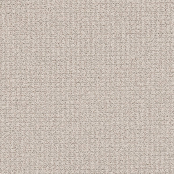 Close-up of Mykonos Berber Carpet in Sorrento, featuring a soft beige tone and textured grid-like weave with small, evenly spaced squares for a luxurious look.