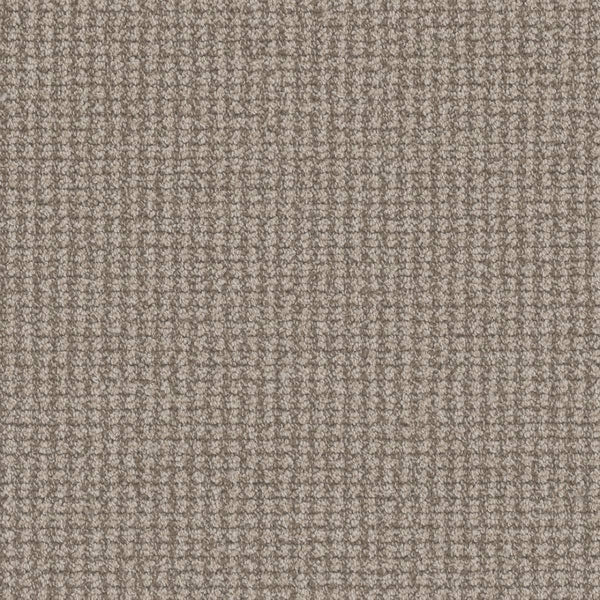 Close-up of Mykonos Berber Carpet in Venice color, showing its light brown, textured woven fabric with a small square grid pattern—soft, durable, and ideal for upholstery, carpeting, or luxury flooring.
