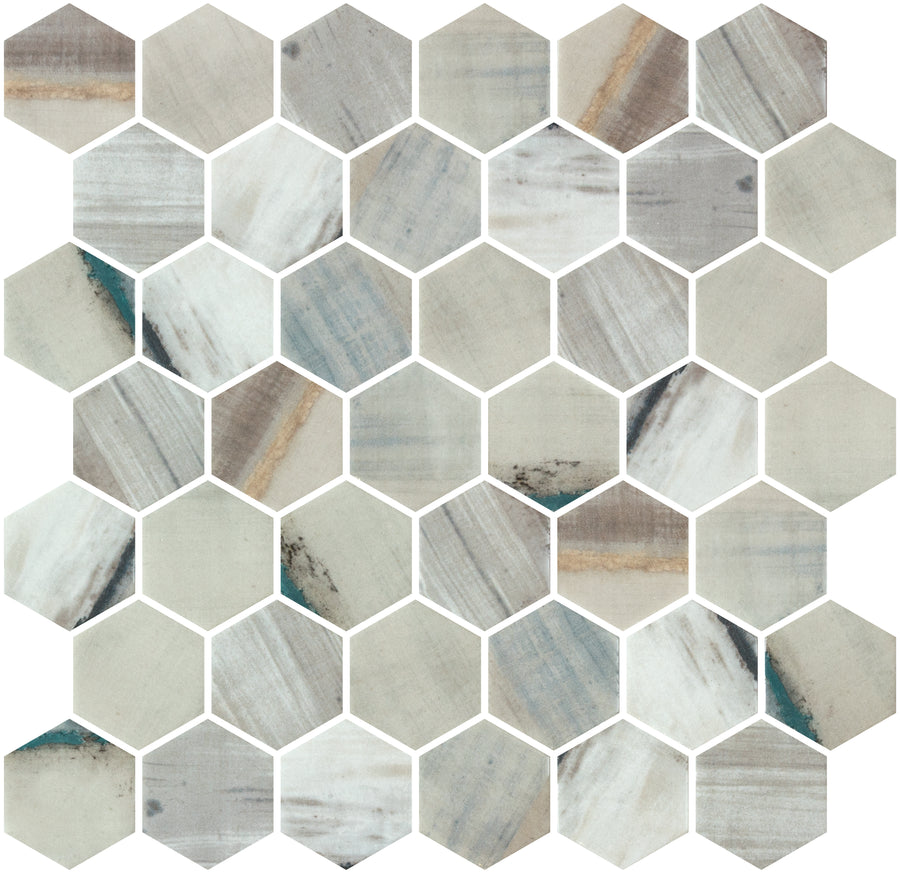 The New Belfont 11 1/8" x 11 1/5" Glass Mosaic Tile in Merida Allure features hexagonal tiles with light and dark gray, beige, and blueish marbled tones—perfect as a modern kitchen or bathroom accent.