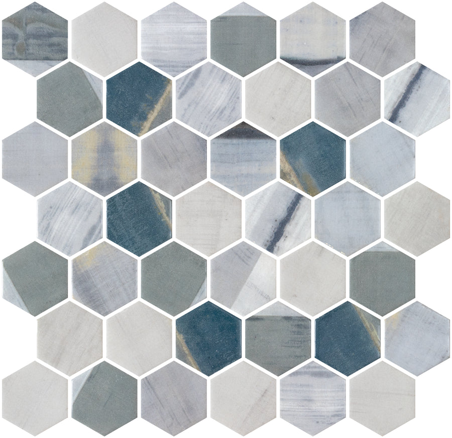 The New Belfont 11 1/8" x 11 1/5" Glass Mosaic Tile in Griego Elegance features a honeycomb pattern with blue, gray, and white tones—ideal for stylish kitchen or bathroom walls, separated by crisp white grout.