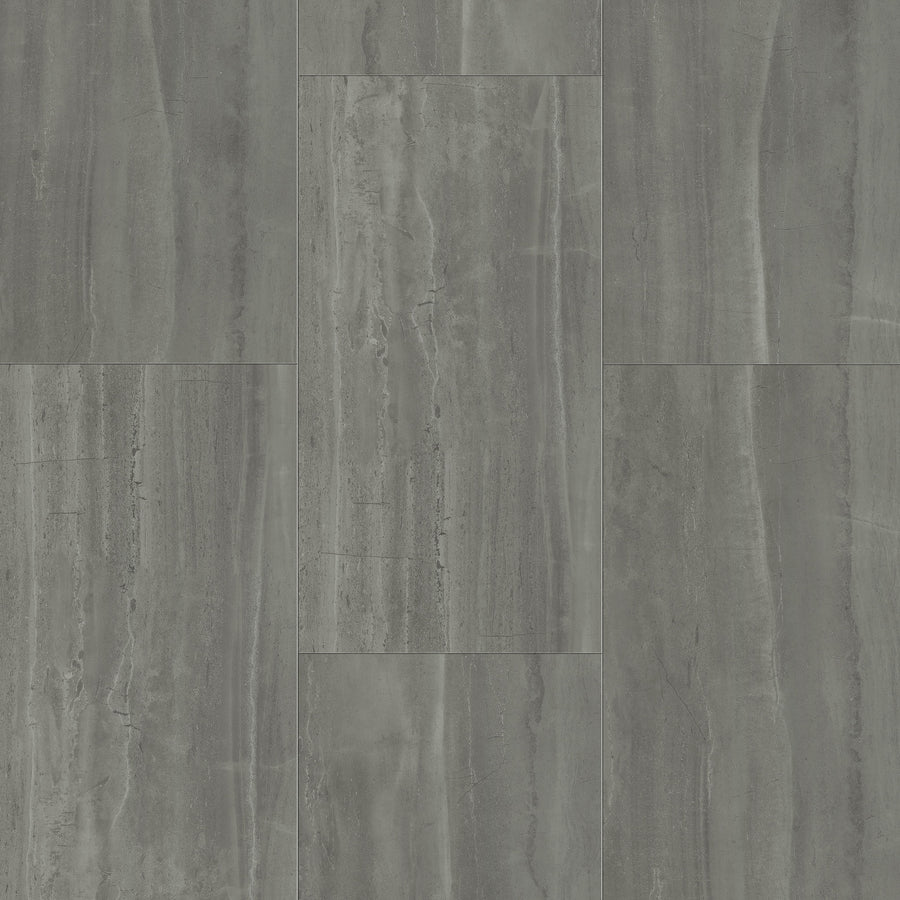Coretec Plus Tile Luxury Vinyl Tile features waterproof, stone-look tiles with a marbled texture and subtle vertical streaks in smooth, mixed gray tones, arranged in a staggered layout for a modern appearance.