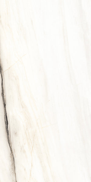 Close-up of a white marble surface with subtle beige and grey veining, featuring a prominent dark vein on the left side. The texture is smooth and polished, giving a natural and elegant appearance.
