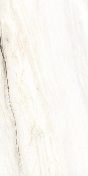 White marble surface with subtle beige and gray veining running diagonally across. The texture is smooth and polished, giving a clean and elegant appearance.