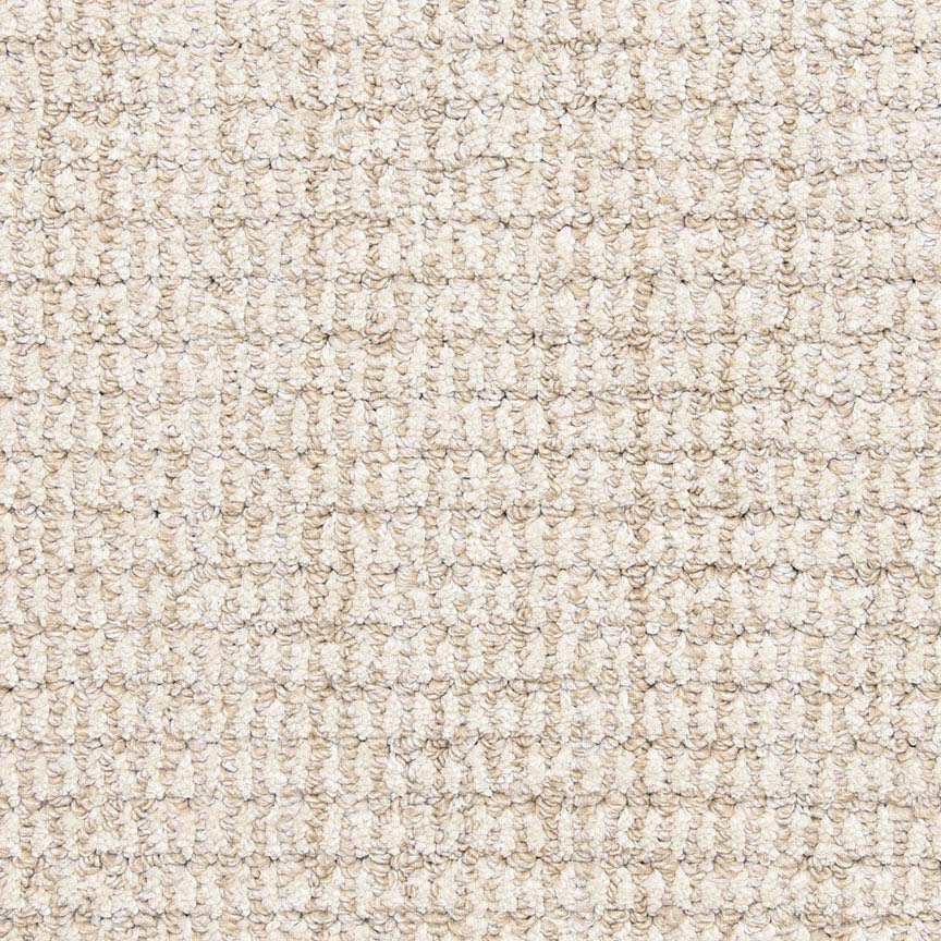 Close-up of Aspen Berber Carpet in Natural color, featuring a looped pile and grid-like textured design. The tightly woven yarns create a soft, durable carpet with a uniform appearance.