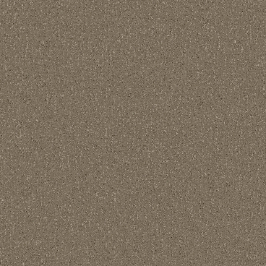 A close-up of the Crafted Tone Pet Friendly Carpet in Natural Stone shows a brown textured fabric with a subtle weave, offering a slightly rough, tactile surface ideal for durable carpeting in busy homes.