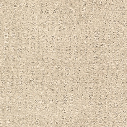 Homage Berber Carpet in Naturelle features a soft, textured surface with a subtle irregular grid pattern of small raised loops and lines—perfect for high-traffic areas.