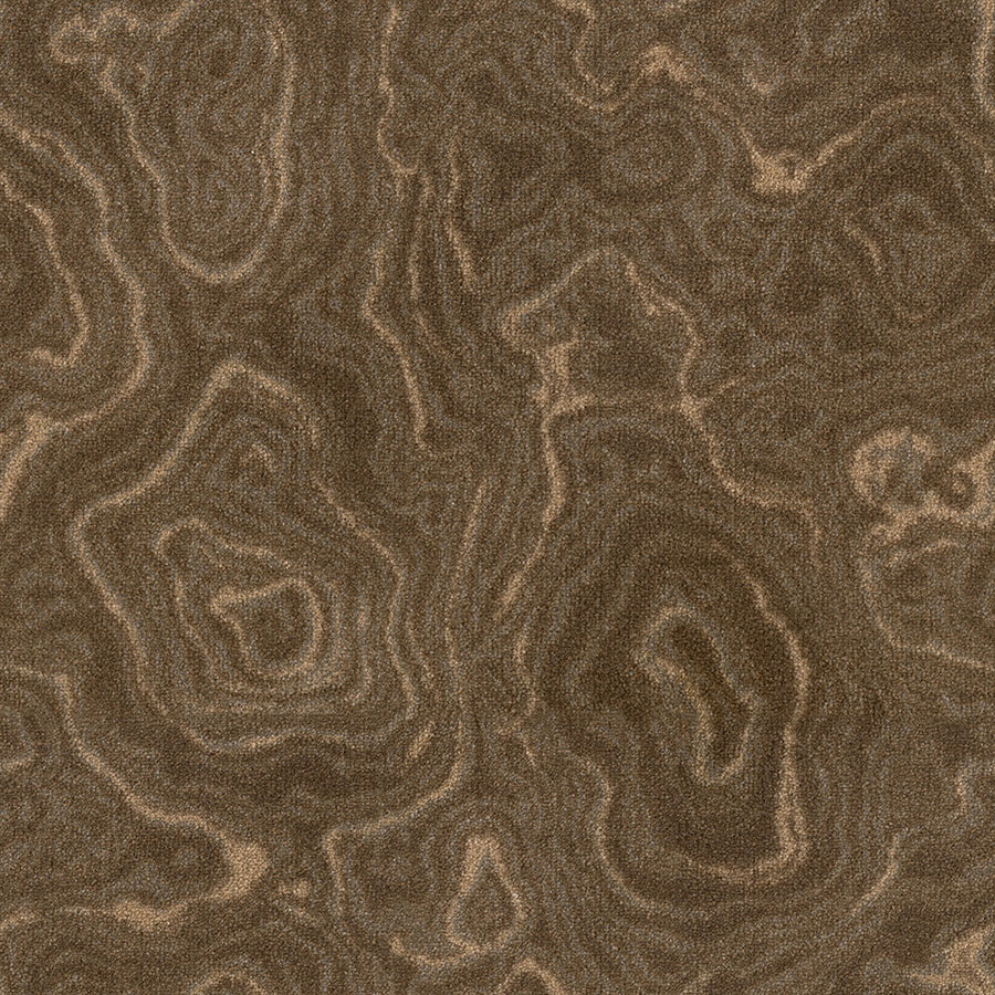 Close-up of Nature's Gem On Trend Carpet shows a textured brown surface with swirling patterns, mimicking wood grain in various shades of brown and tan for a natural, organic look.