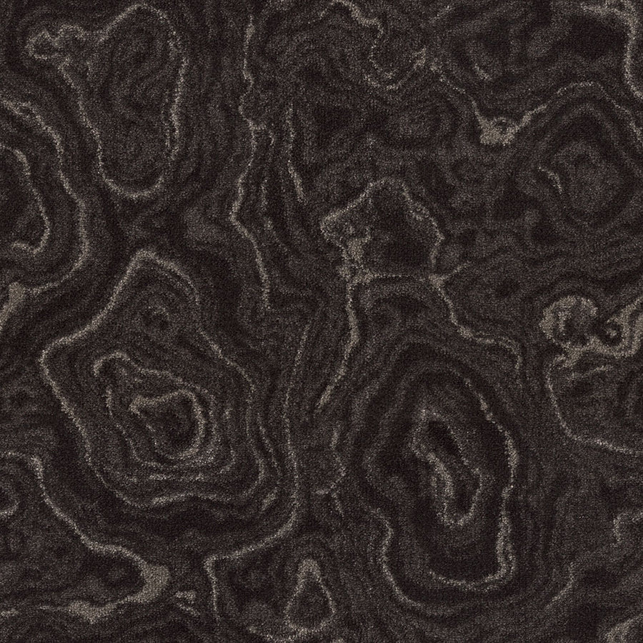 Nature's Gem On Trend Carpet features a dark brown and black marbled stone texture with swirling, layered patterns that resemble wood grain or geological formations, offering rich, organic wavy lines for a natural look.