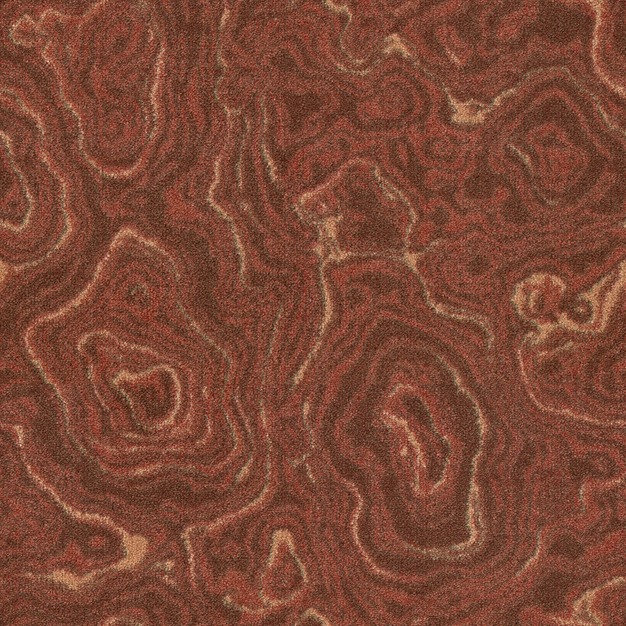 Close-up of Nature's Gem On Trend Carpet featuring organic, wavy patterns in reddish-brown and tan, inspired by wood grain and geological formations like agate or marble.